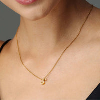 Thumbnail for Iconic Initial Necklace by Brother & Sisters featuring a gold letter 'S' pendant, adding personalized elegance.