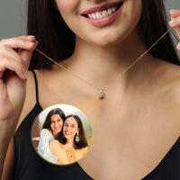 Thumbnail for Woman wearing a Square Photo Necklace with a personalized photo charm, designed by Brother & Sisters.