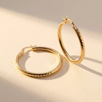 Thumbnail for Diamond Cut Statement Hoops in Gold, product photo | SKU: 41009-gold