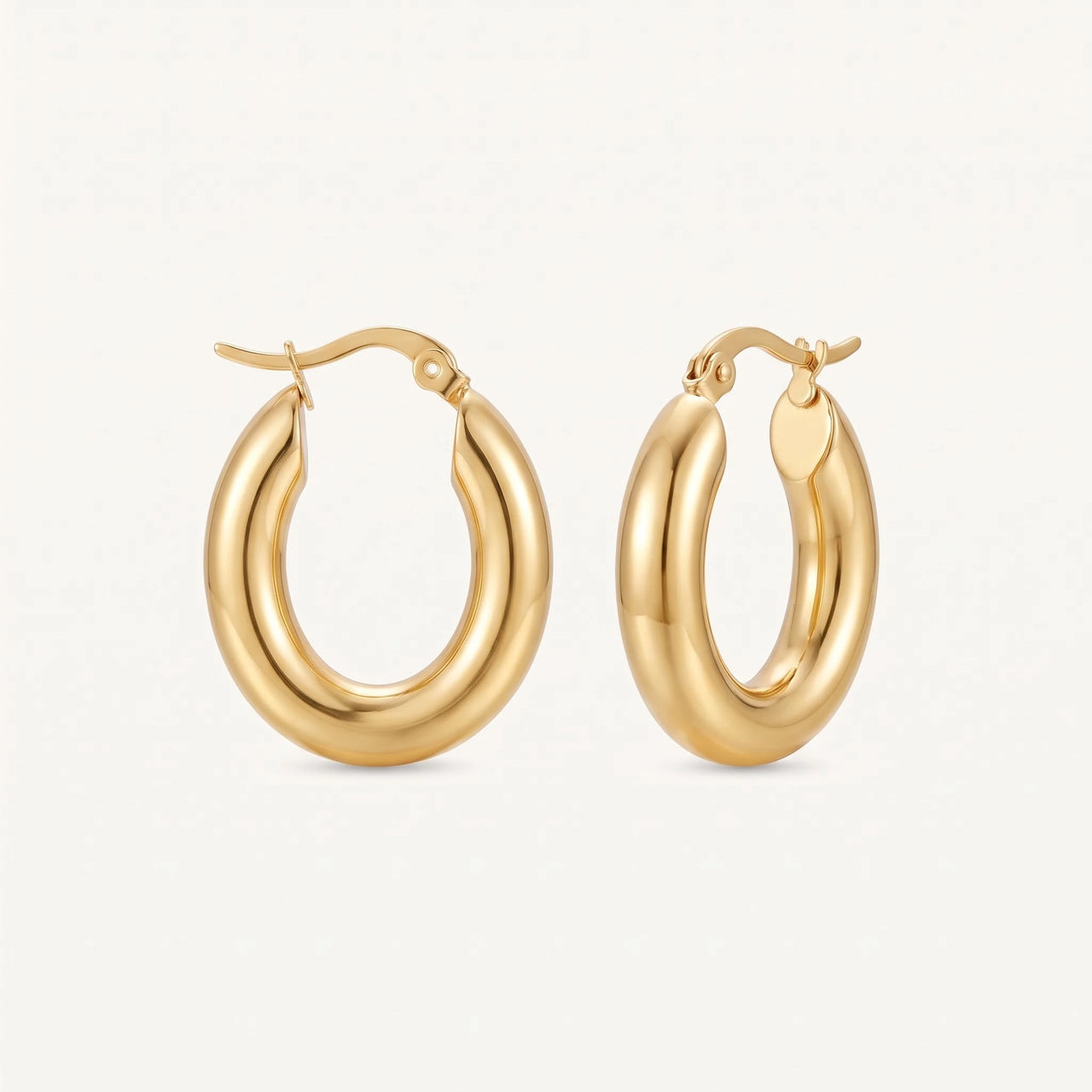 Chunky gold hoops — product photo on a white background, gold | SKU: lesbrillantes