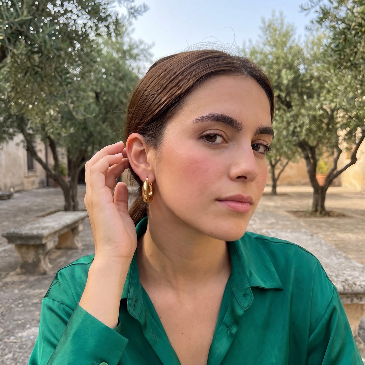 Chunky gold hoops — worn, everyday gesture, gold | SKU: lesbrillantes
