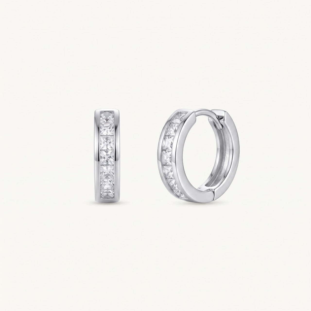 Silver huggie earrings — product photo on a white background, silver | SKU: 22023999-rhodium