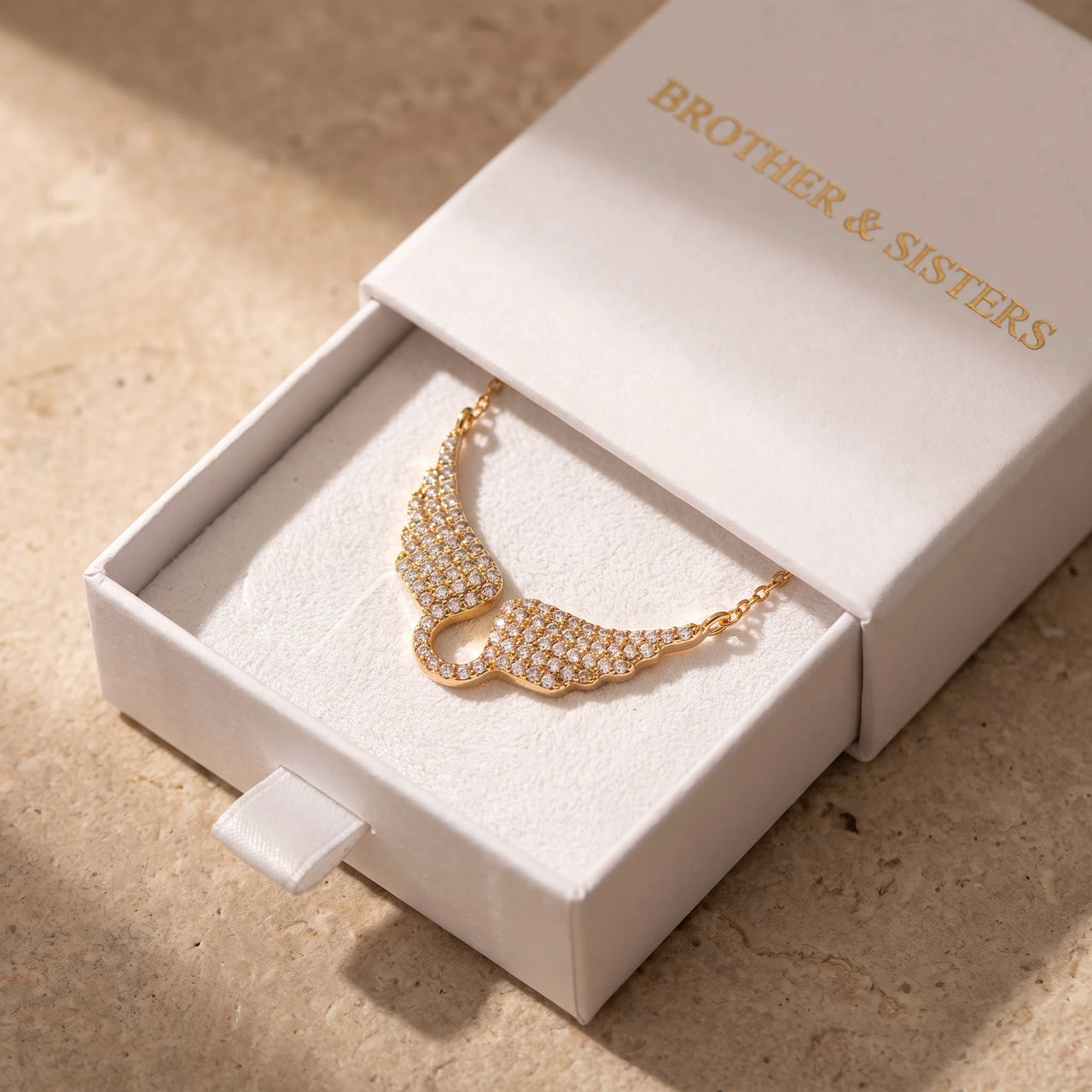 The gold necklace in the Brother & Sisters gift box | SKU: 42002-gold