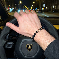 Thumbnail for Rose Gold Lion & Black Stones Bracelet – worn at the steering wheel of a luxury car | Brother & Sisters | SKU: 20712286-rose-gold-XS-14-15, 20712286-rose-gold-S-16-17, 20712286-rose-gold-M-18-19, 20712286-rose-gold-L-20-21, 20712286-rose-gold-XL-22-23
