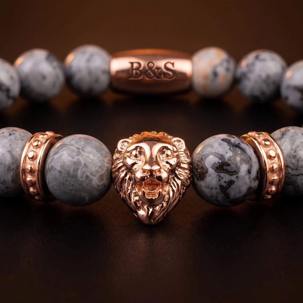 Rose Gold Lion & Grey Stones Bracelet – macro detail of the lion head | Brother & Sisters | SKU: 20866222-rose-gold-XS-14-15, 20866222-rose-gold-S-16-17, 20866222-rose-gold-M-18-19, 20866222-rose-gold-L-20-21, 20866222-rose-gold-XL-22-23