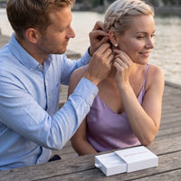 Thumbnail for Snowflake stud earrings — worn by a couple, silver | SKU: 30876249